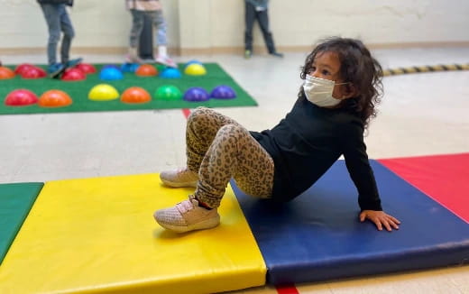 a child on a mat