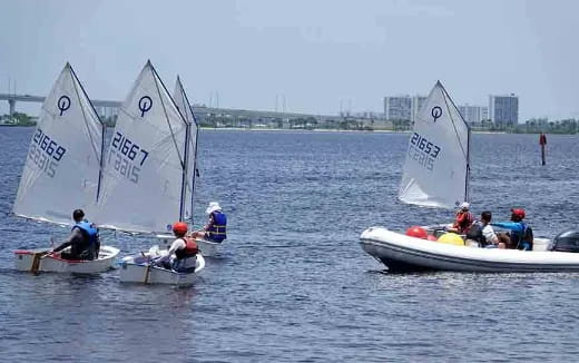 a group of people sailing on the sea