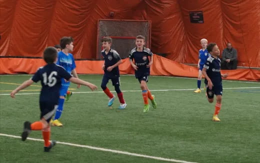 a group of men playing football