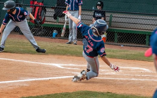 a baseball player swinging a bat
