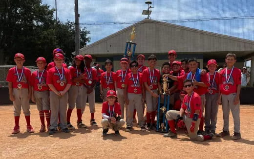 a group of baseball players posing for a photo