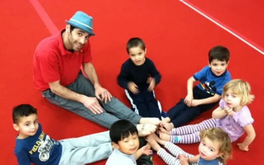 a person and a group of children