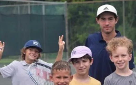 a group of boys posing for a photo