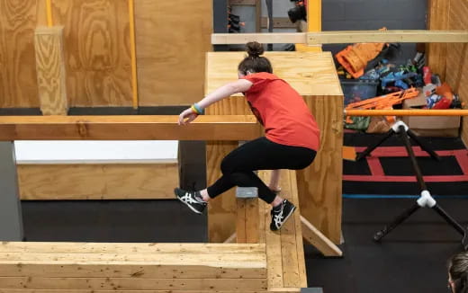 a person doing a plank on a bar