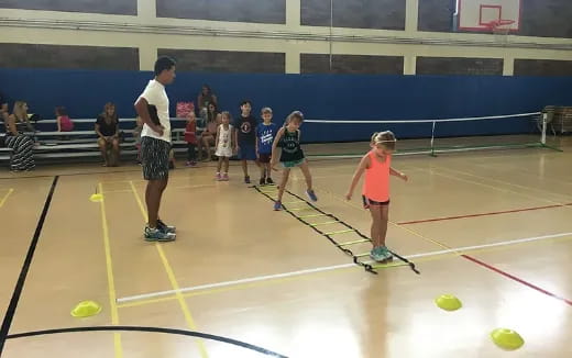 a group of kids playing a sport