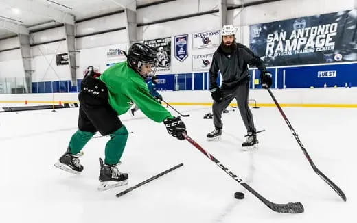 a group of men playing hockey
