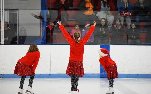 a group of people ice skating