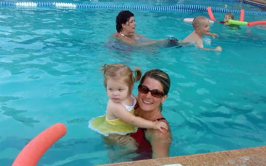 a group of people in a pool