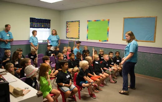 a group of people in a classroom