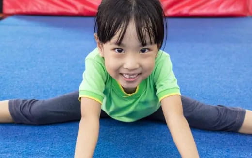 a boy lying on the floor