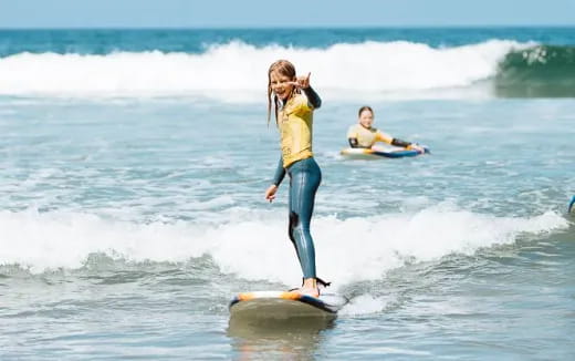 a person on a surfboard in the ocean