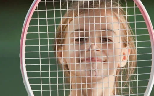 a person with a tennis racket