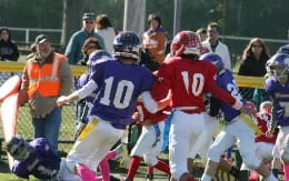 a group of people playing football