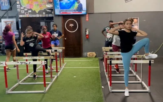 a group of people in a gym