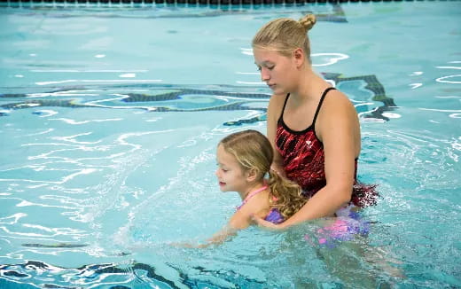 a person and a child in the water