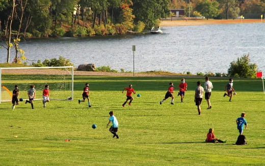 a group of people playing football