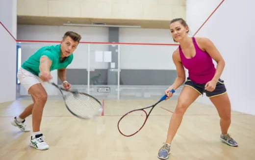 a couple of women playing tennis