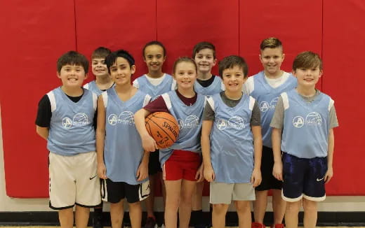 a group of kids posing for a picture