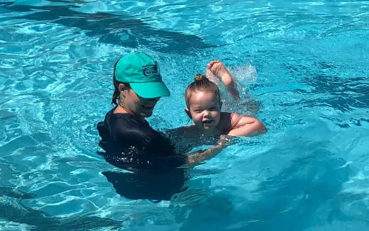a man and woman in a pool