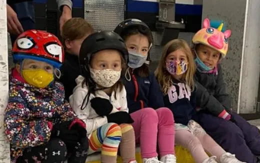 a group of children wearing clothing