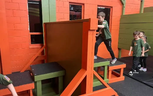 a group of kids playing on a playground