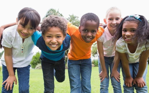 a group of children posing for a photo
