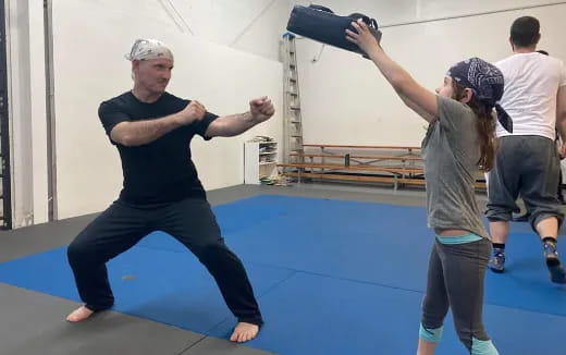 a man and a woman exercising