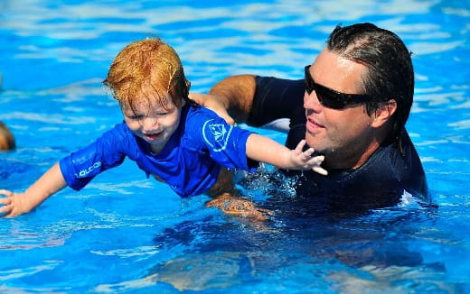 a man and a boy in the water