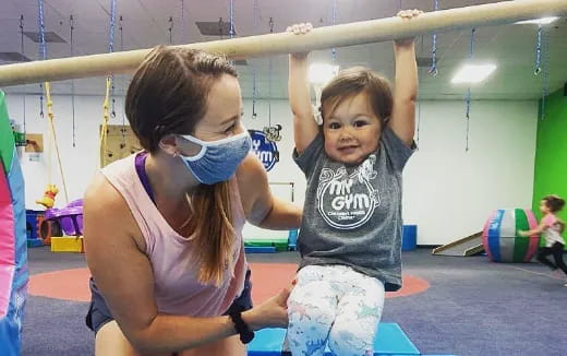 a couple of kids in a gym