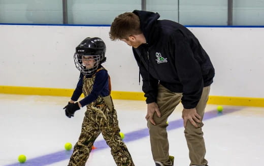 a man and a child on ice