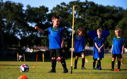 a group of boys playing football