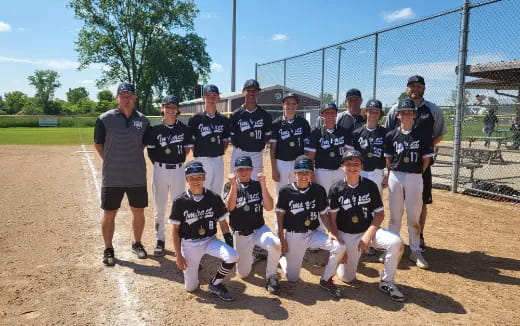 a group of baseball players posing for a photo