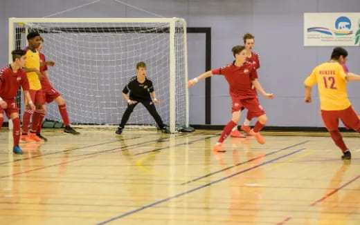 a group of people playing a sport