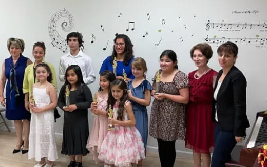 a group of people posing for a photo