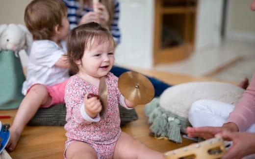 a group of children playing with toys