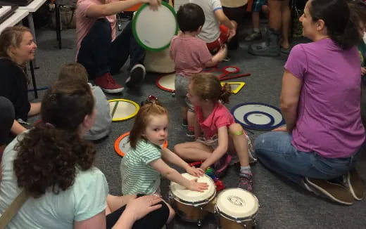 a group of people playing drums
