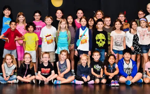 a group of children posing for a photo