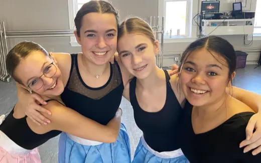 a group of people posing for the camera