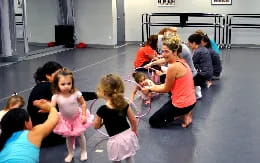a group of people sitting on the floor
