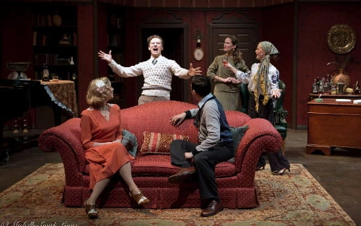 a group of people sitting on a couch