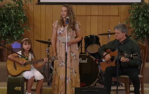 a group of people playing instruments