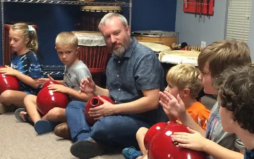 a person sitting with kids