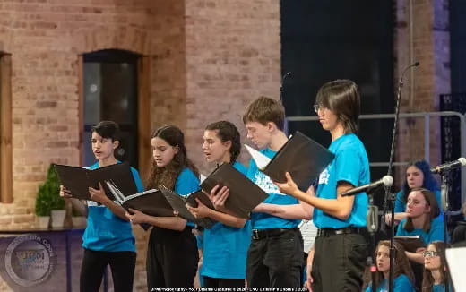 a group of kids playing instruments