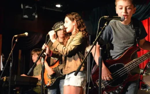 a group of people playing instruments