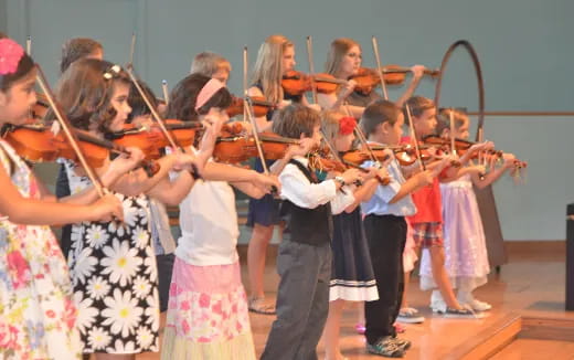 a group of people playing instruments