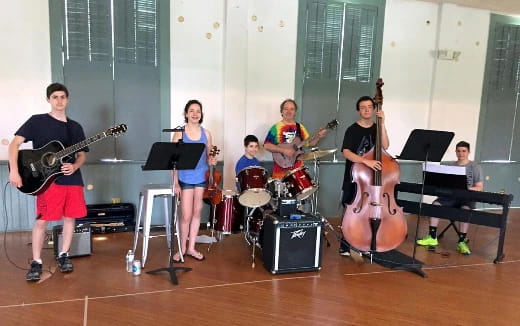 a group of people playing instruments