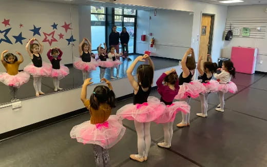 a group of girls in a dance class