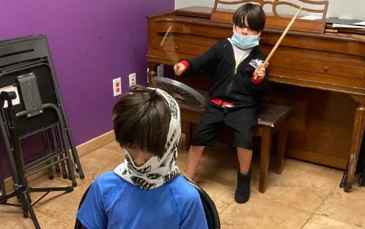 a boy and girl playing a game
