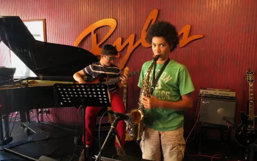 a group of people playing instruments