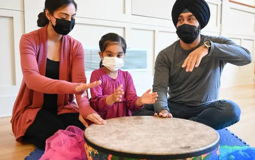 a group of people wearing masks